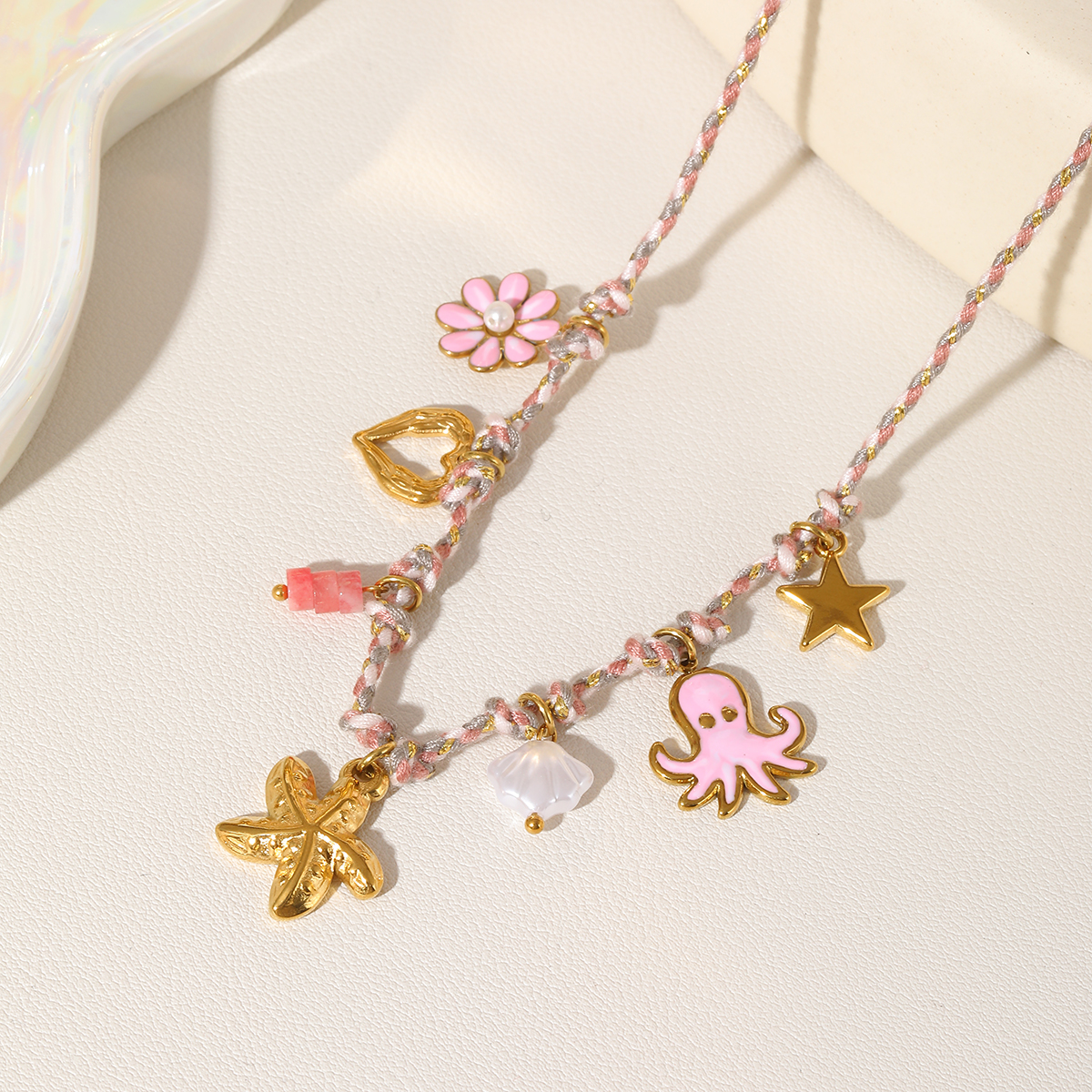 Γυναικείο Κολιέ Pink Octopus από Ανοξείδωτο Ατσάλι σε Πολύχρωμο Κορδόνι Γυναικείο Κολιέ Pink Octopus από Ανοξείδωτο Ατσάλι σε Πολύχρωμο Κορδόνι