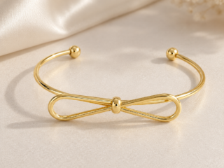 Γυναικείο Βραχιόλι Bow Open Cuff από Ανοξείδωτο Ατσάλι Επιχρυσωμένο 18Κ με Φιόγκο Ανοιχτού Τύπου
